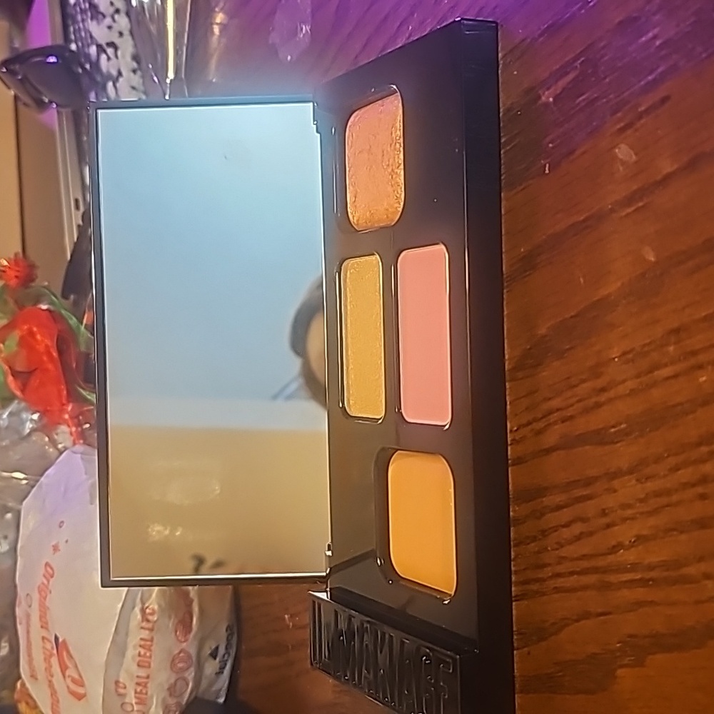 Highpoint bronzer, highlighter,  and blush palatte
